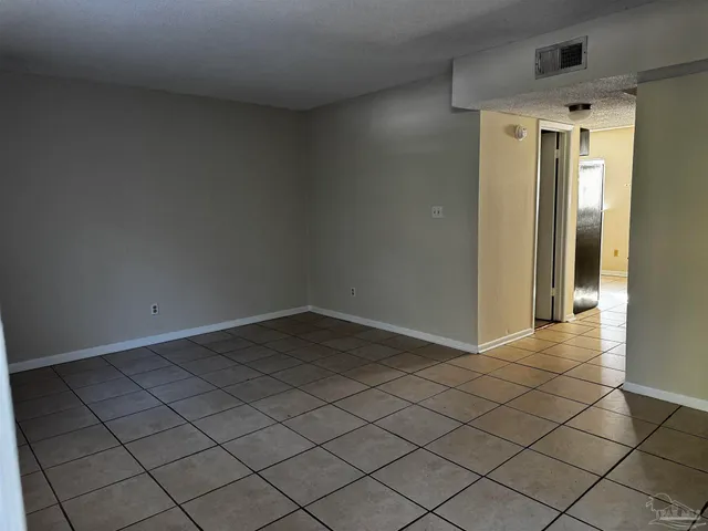 an empty room and closet area