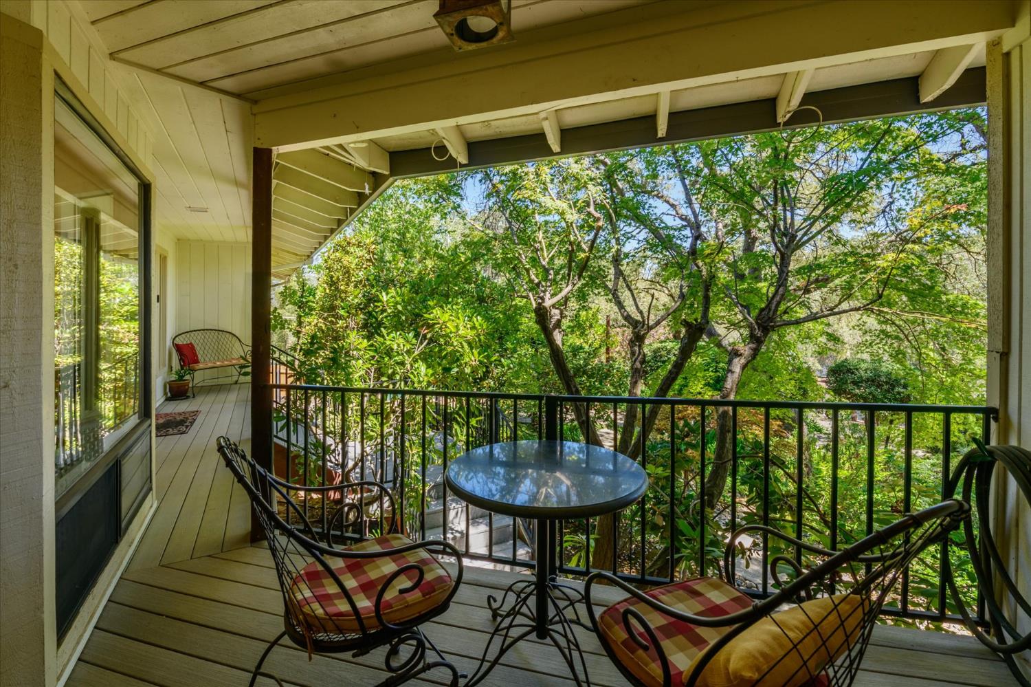 3165 Oakwood Road Cameron Park, CA 95682 - Photo 18 of 55 Outdoor spaces continue to invite you in, with another comfortable place to sit and enjoy the view with your morning coffee.