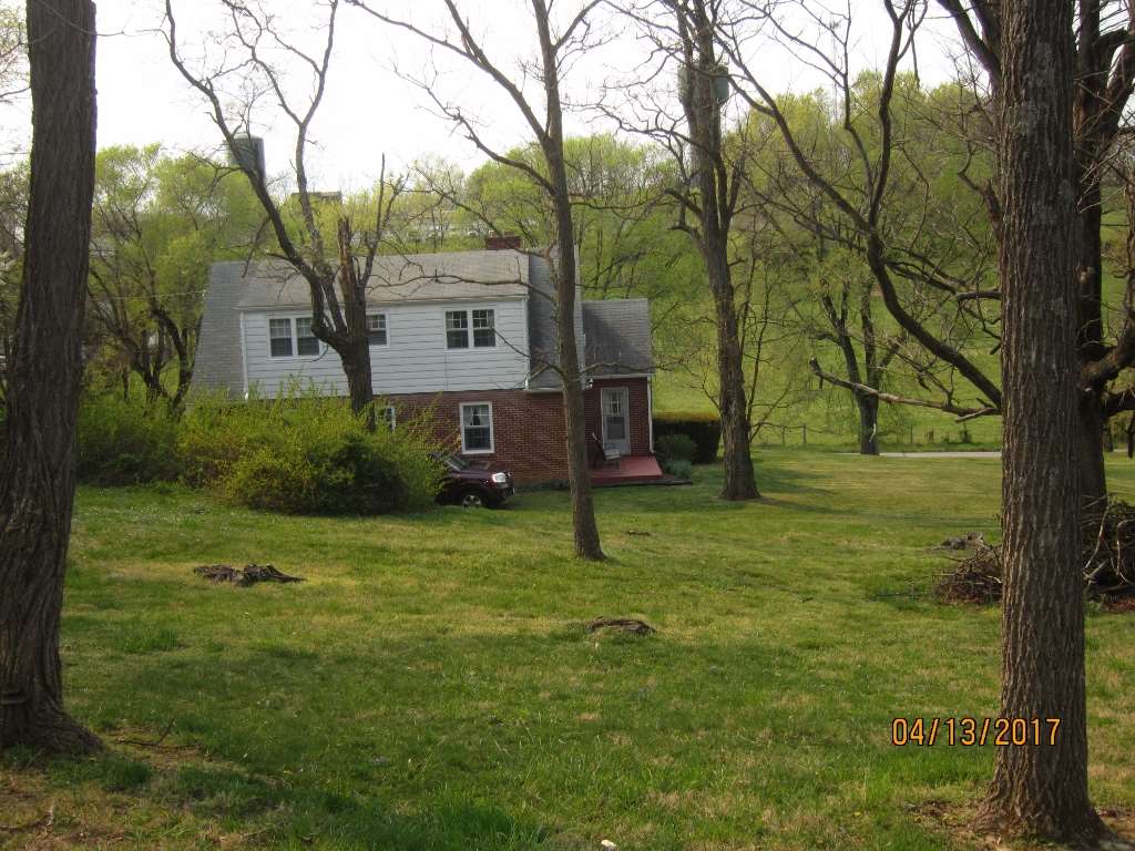 1917 Shutterlee Mill Road Staunton, VA 24401 - Photo 33 of 40 a view of a house with a yard