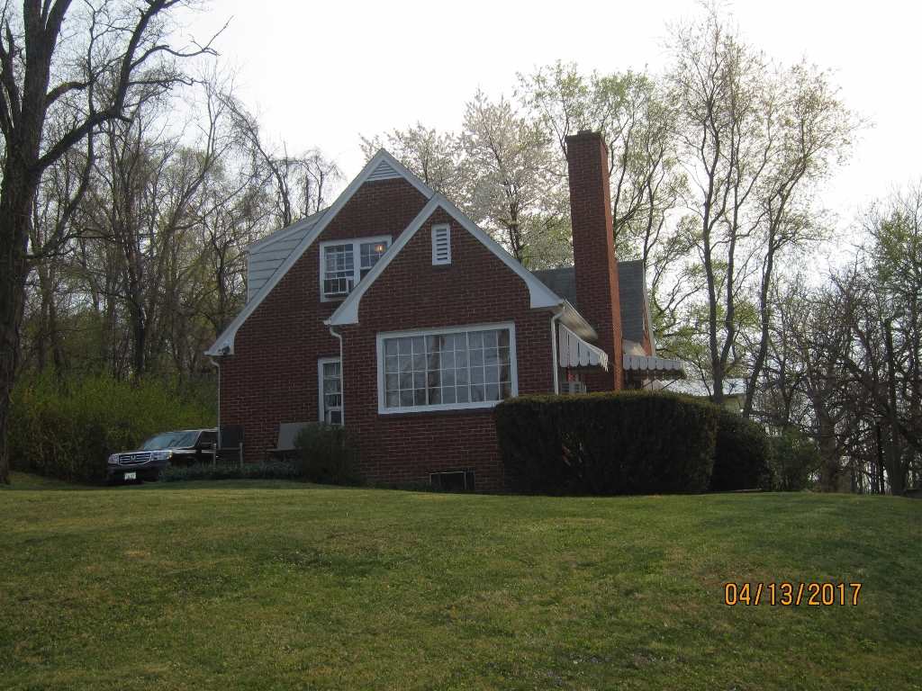 1917 Shutterlee Mill Road Staunton, VA 24401 - Photo 34 of 40 a front view of a house with garden