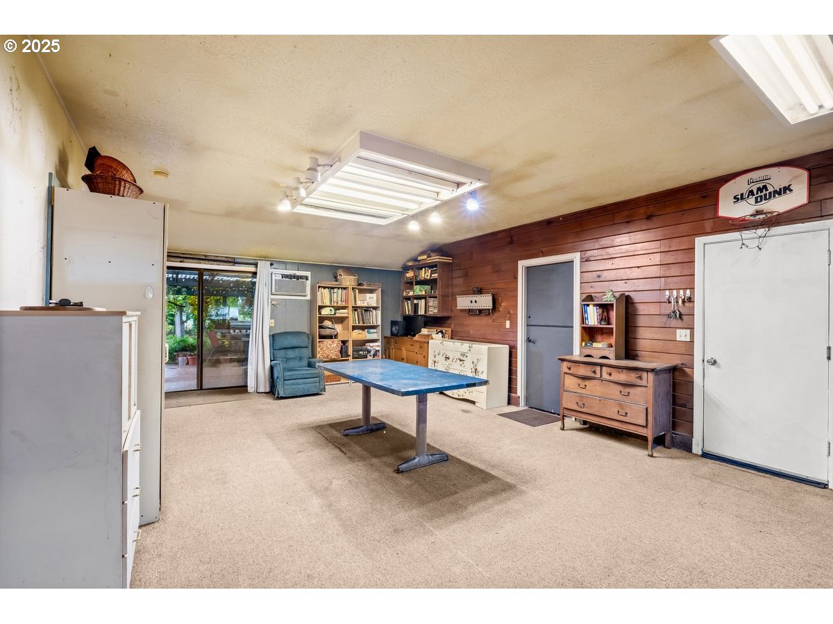 12602 Fry Road Northeast Aurora, OR 97002 - Photo 17 of 47 a living room with furniture and a table