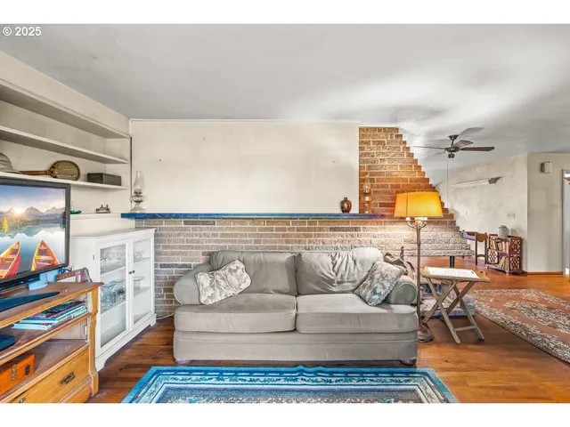 a view of a living room and a window