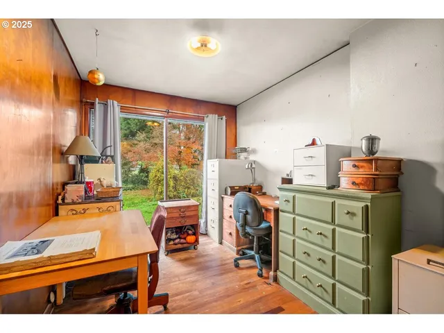 a bathroom with a sink vanity mirror and toilet