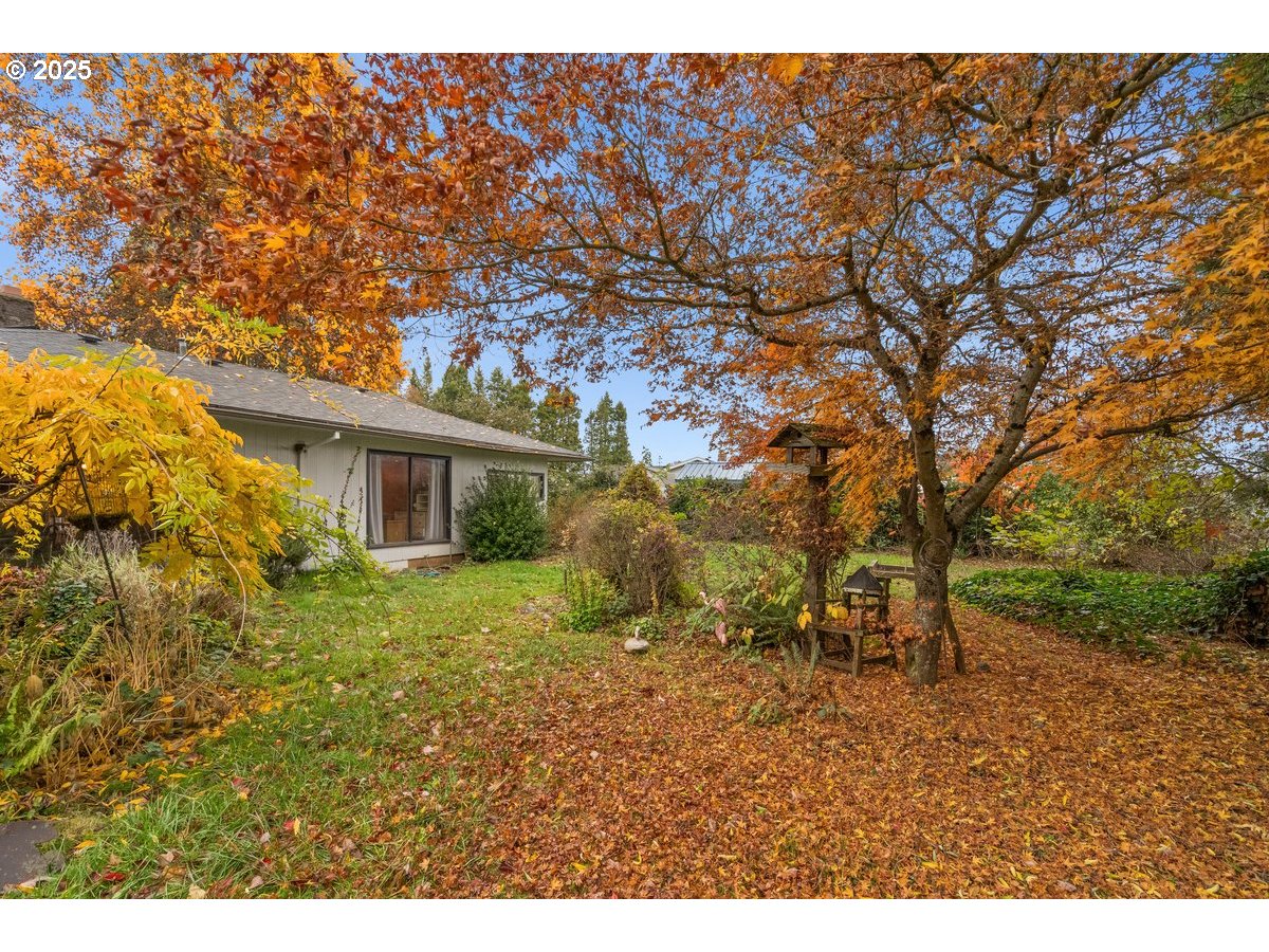 12602 Fry Road Northeast Aurora, OR 97002 - Photo 31 of 47 a view of a house with a yard