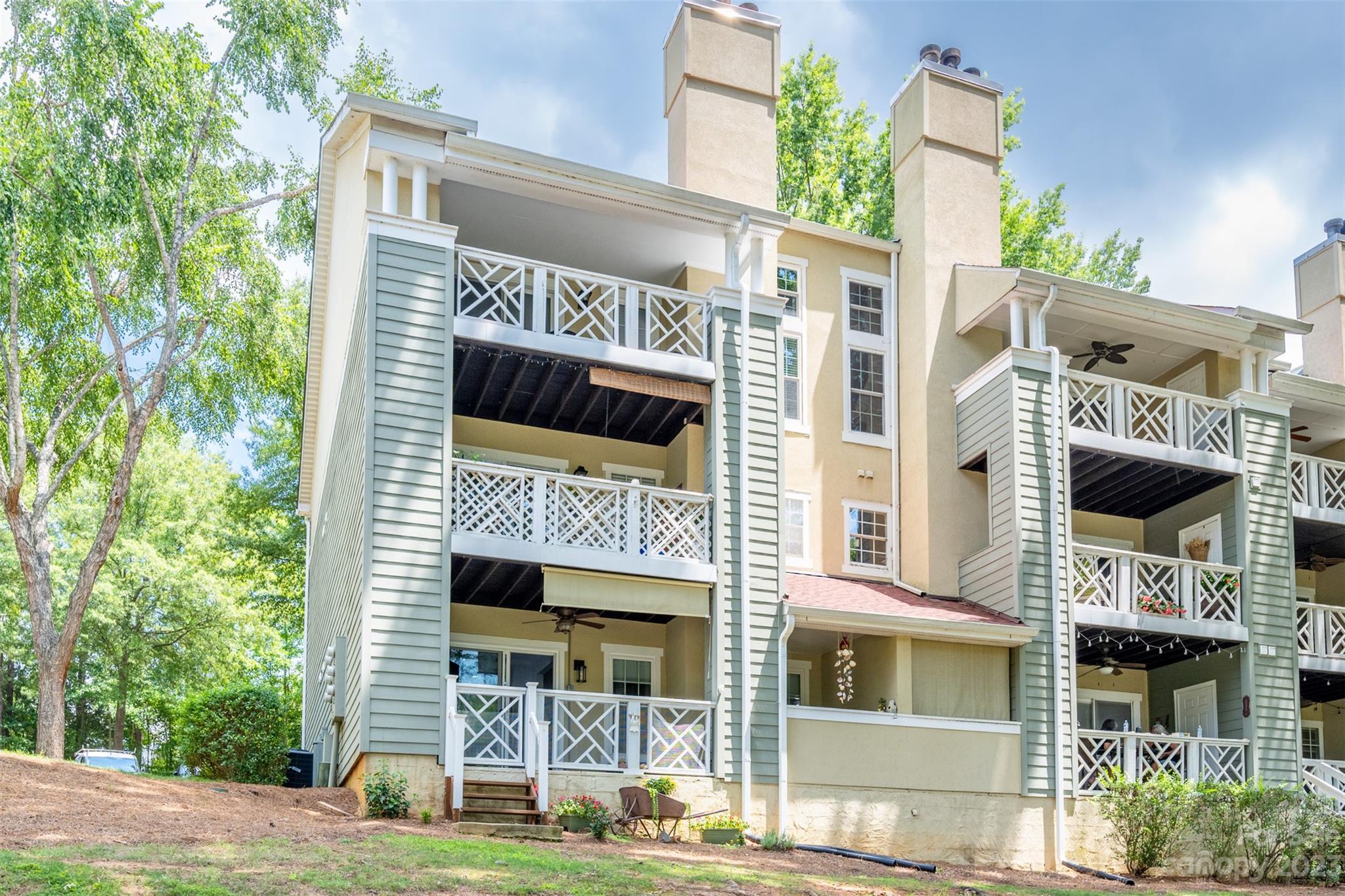 20101 Henderson Road, Unit H Cornelius, NC 28031 - Photo 29 of 48 a front view of a building with garden