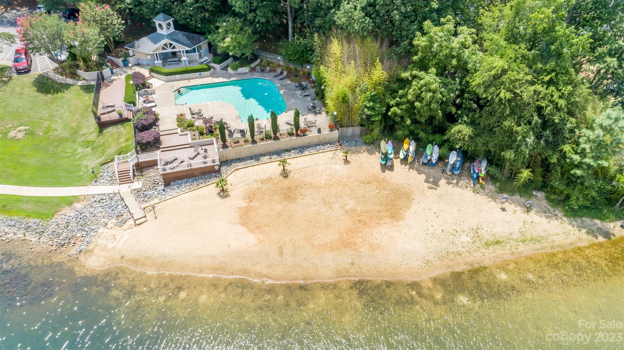 20101 Henderson Road, Unit H Cornelius, NC 28031 - Photo 42 of 48 a view of a swimming pool with an outdoor space and seating area