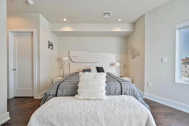 a view of a living room and entry way