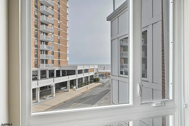 a bathroom with a toilet a sink and shower