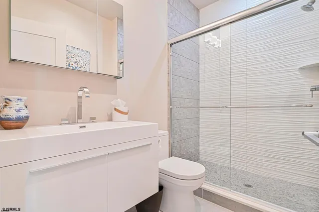 a bedroom with a bed and a table