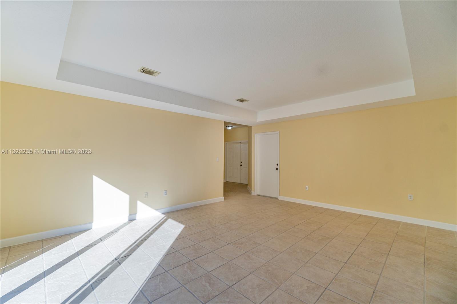 13040 Southwest 142nd Terrace Miami, FL 33186 - Photo 11 of 26 a view of an empty room