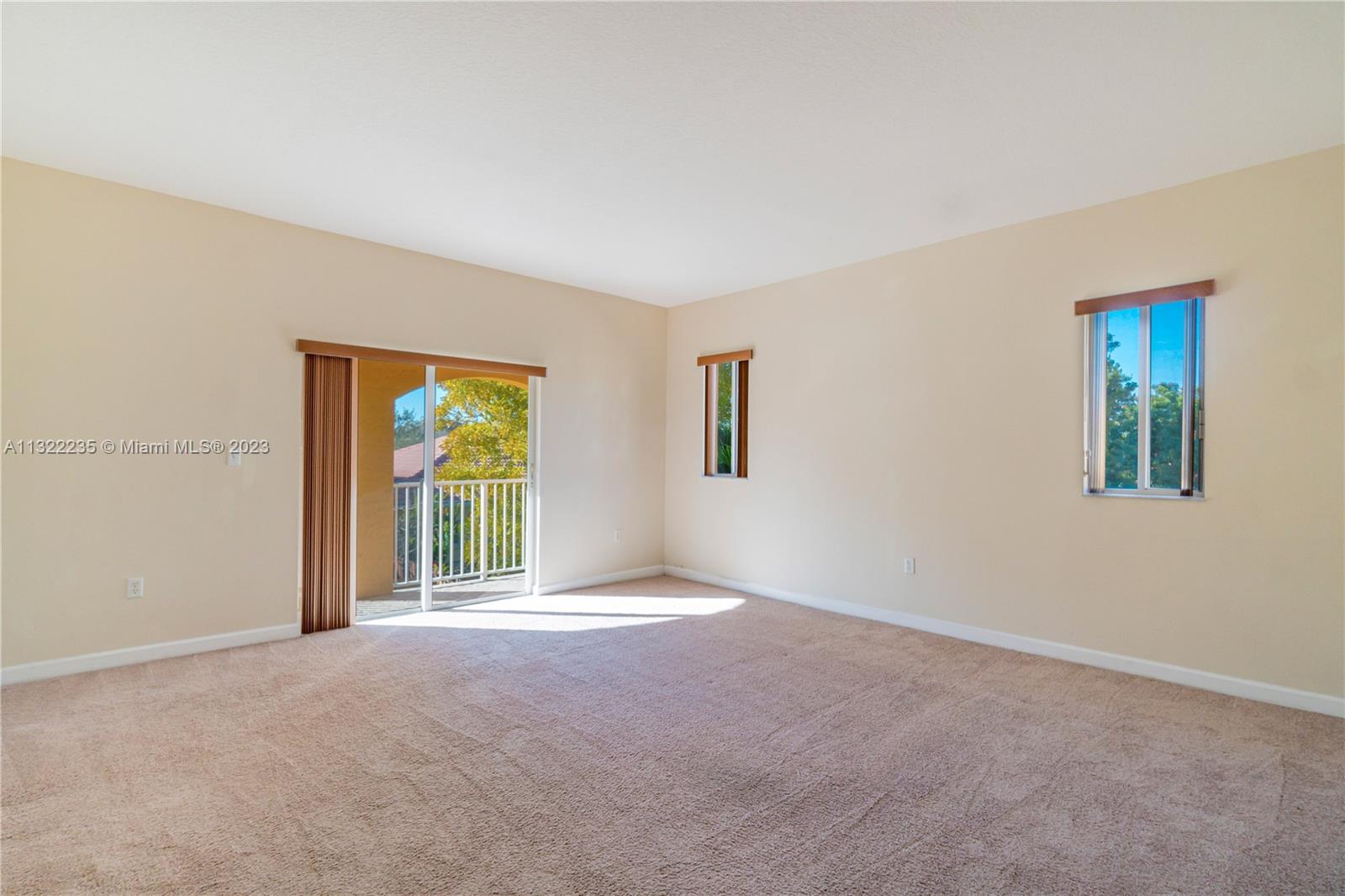13040 Southwest 142nd Terrace Miami, FL 33186 - Photo 16 of 26 a view of an empty room with a window