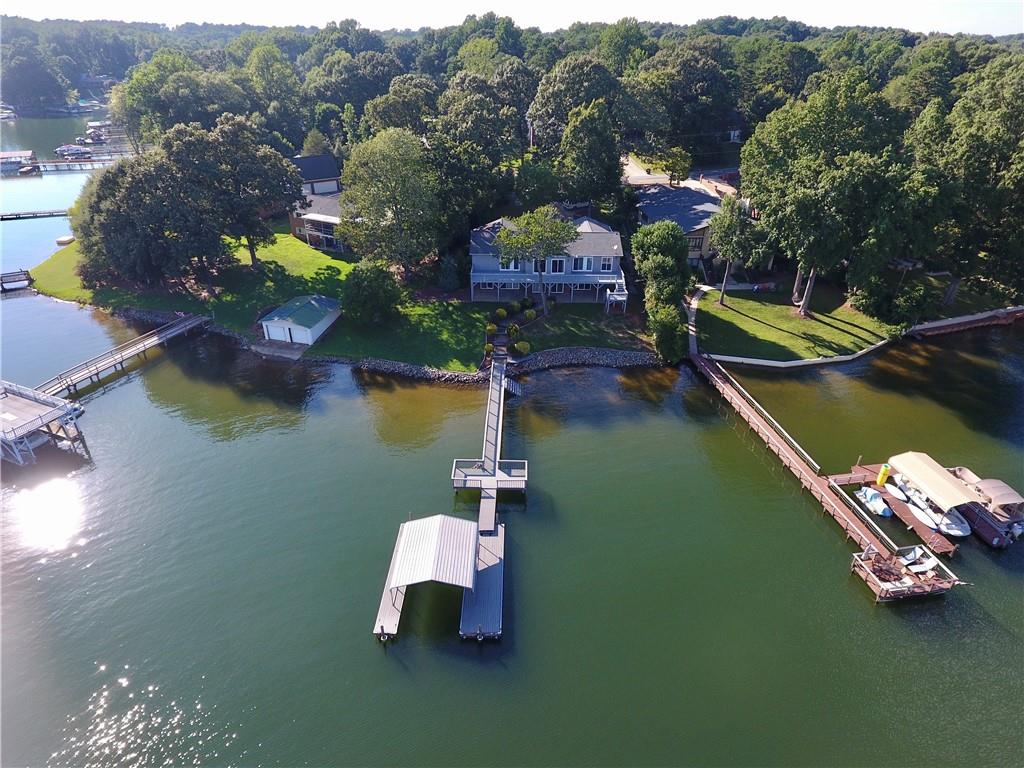 3972 Lake Shore Road South Denver, NC 28037 - Photo 1 of 48 an aerial view of house with yard swimming pool and outdoor seating