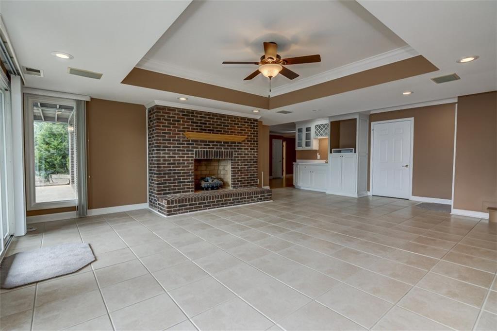 3972 Lake Shore Road South Denver, NC 28037 - Photo 20 of 48 a view of an empty room with a fireplace