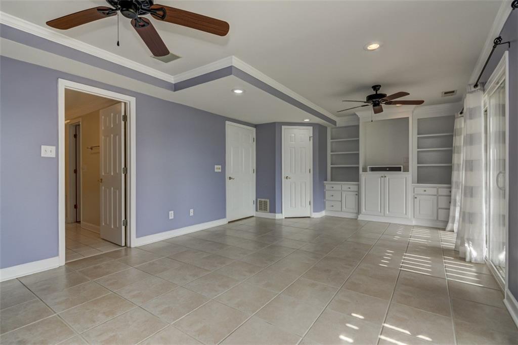 3972 Lake Shore Road South Denver, NC 28037 - Photo 23 of 48 a view of a livingroom with a ceiling fan & entryway