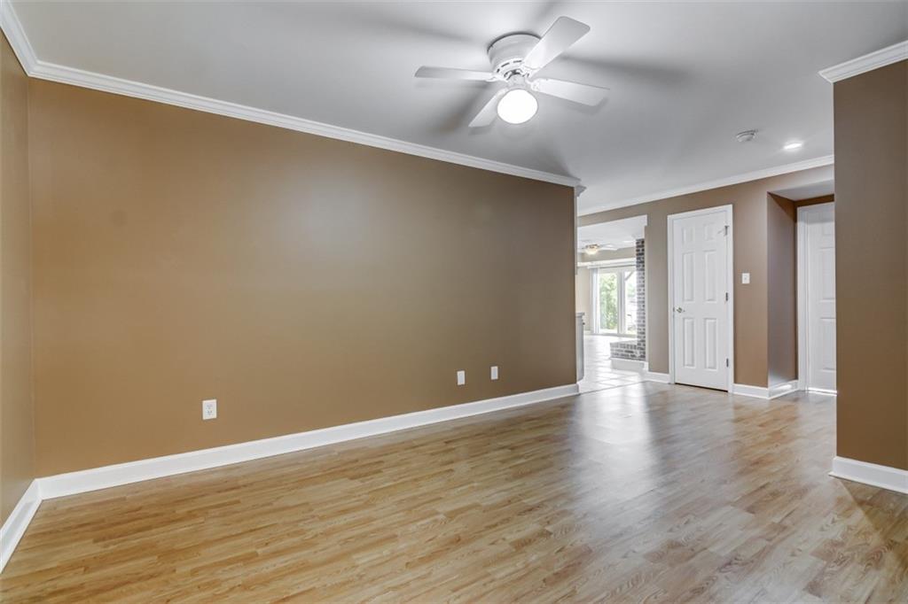 3972 Lake Shore Road South Denver, NC 28037 - Photo 29 of 48 a view of an empty room with wooden floor