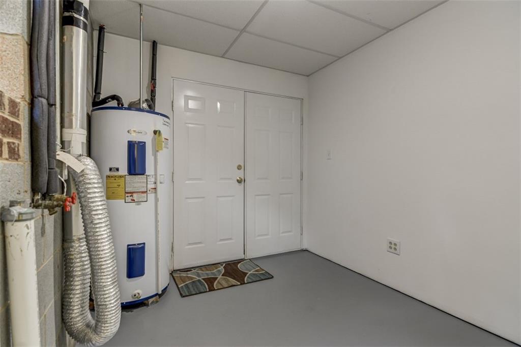 3972 Lake Shore Road South Denver, NC 28037 - Photo 30 of 48 a view of a storage & utility room with a washer and dryer