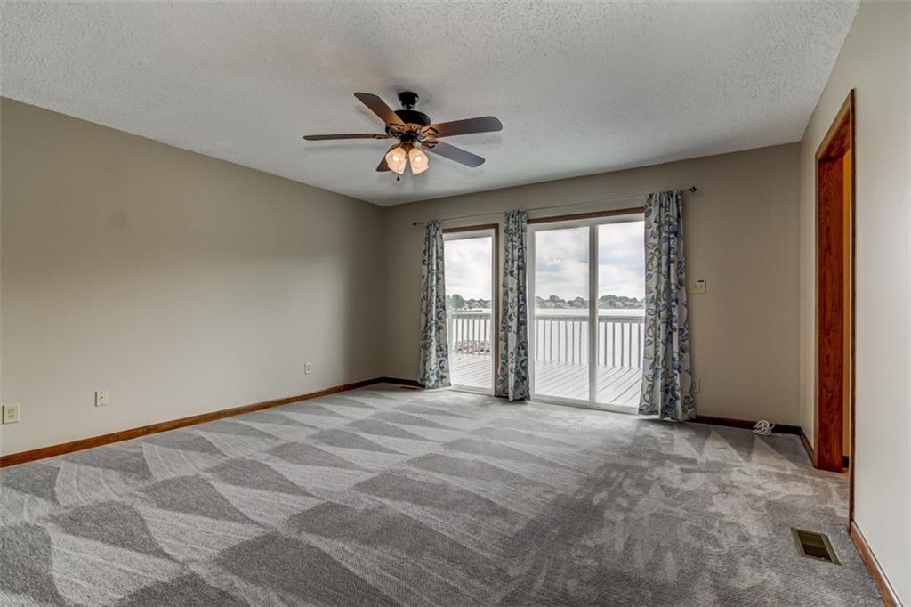3972 Lake Shore Road South Denver, NC 28037 - Photo 37 of 48 a view of an empty room with a window