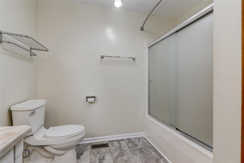 3972 Lake Shore Road South Denver, NC 28037 - Photo 40 of 48 a bathroom with a toilet and a shower