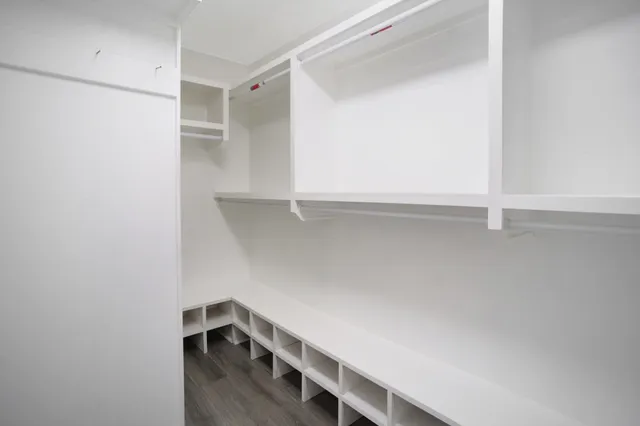 a view of an empty walk in closet