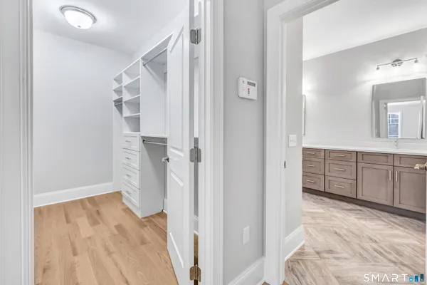 a view of a bedroom with closet