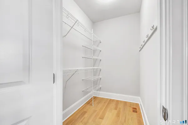 a view of a room with racks on the wall