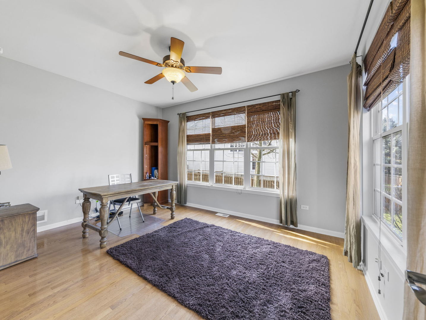 26528 Rustling Birch Way Plainfield, IL 60585 - Photo 13 of 39 a view of a workspace with furniture and a window