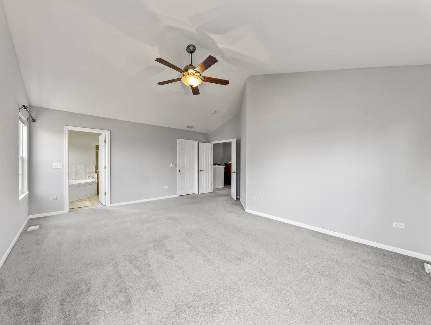 26528 Rustling Birch Way Plainfield, IL 60585 - Photo 17 of 39 a view of empty room with window and ceiling fan
