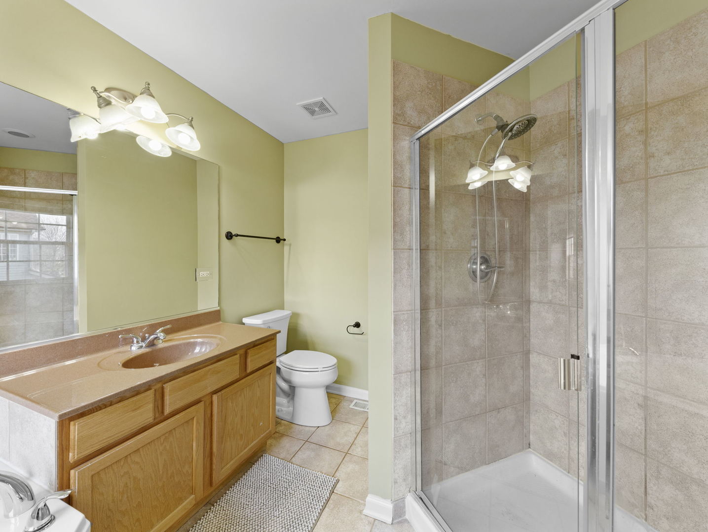 26528 Rustling Birch Way Plainfield, IL 60585 - Photo 20 of 39 a bathroom with a double vanity sink mirror and toilet