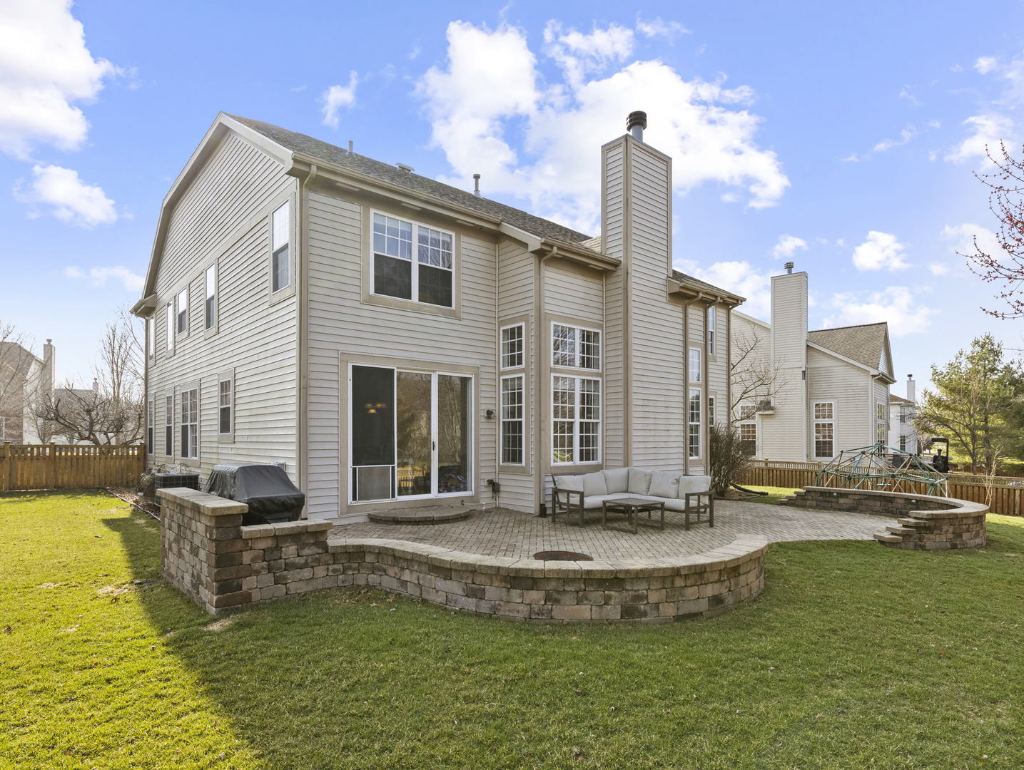 26528 Rustling Birch Way Plainfield, IL 60585 - Photo 34 of 39 a view of a swimming pool with a sitting space