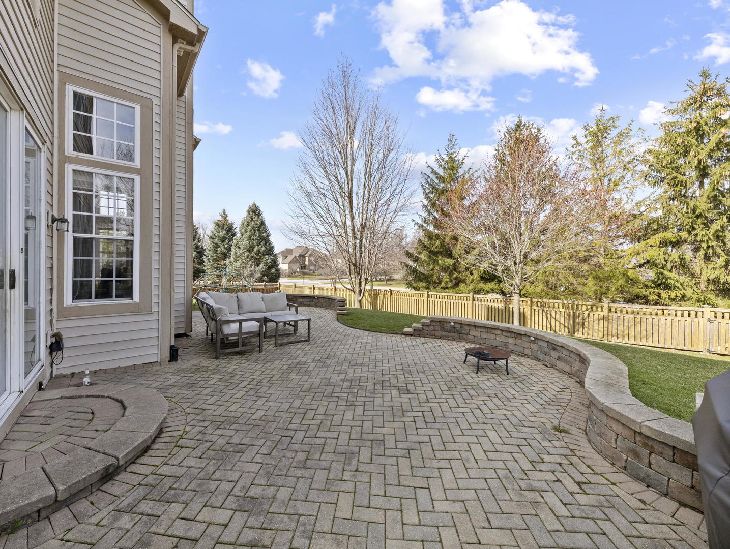 26528 Rustling Birch Way Plainfield, IL 60585 - Photo 36 of 39 a view of a patio with a yard