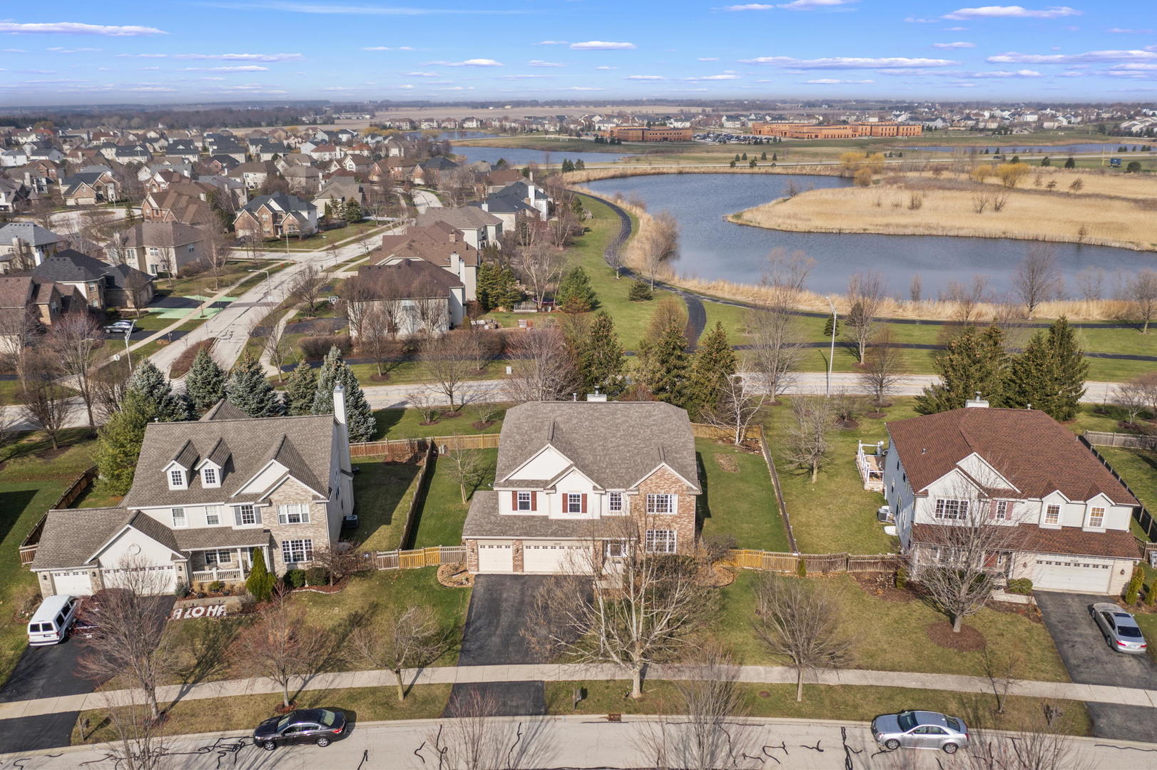 26528 Rustling Birch Way Plainfield, IL 60585 - Photo 37 of 39 an aerial view of residential building and parking space
