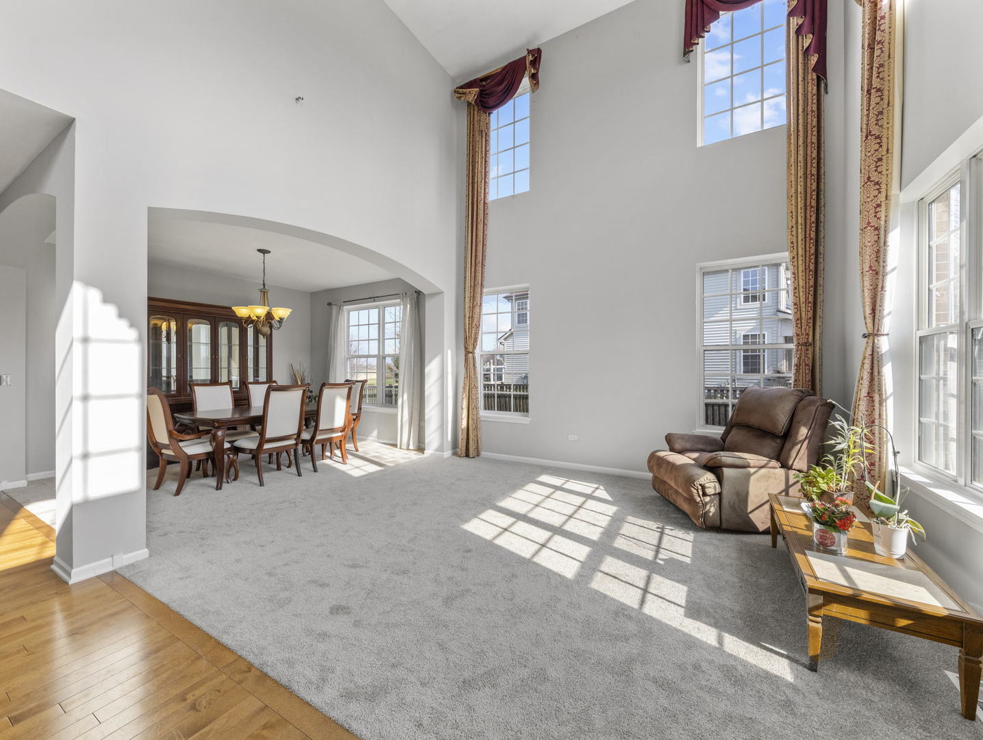 26528 Rustling Birch Way Plainfield, IL 60585 - Photo 4 of 39 a living room with furniture and a table