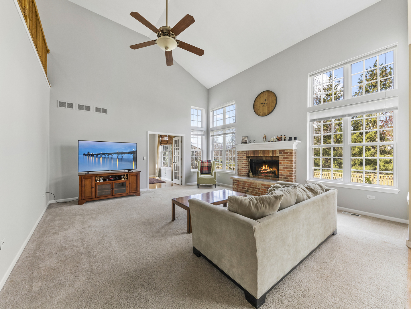 26528 Rustling Birch Way Plainfield, IL 60585 - Photo 10 of 39 a living room with furniture and a fireplace
