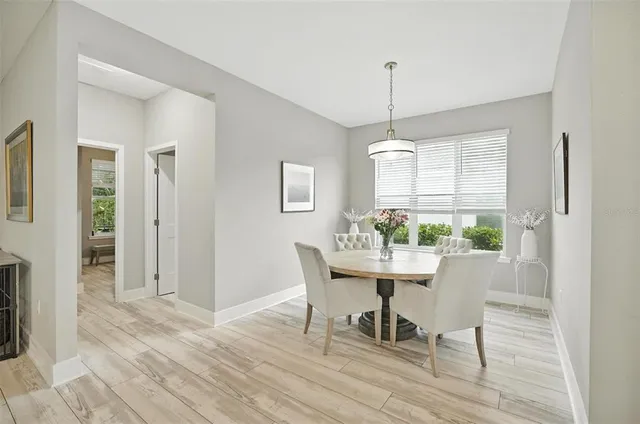 a workspace with furniture and wooden floor