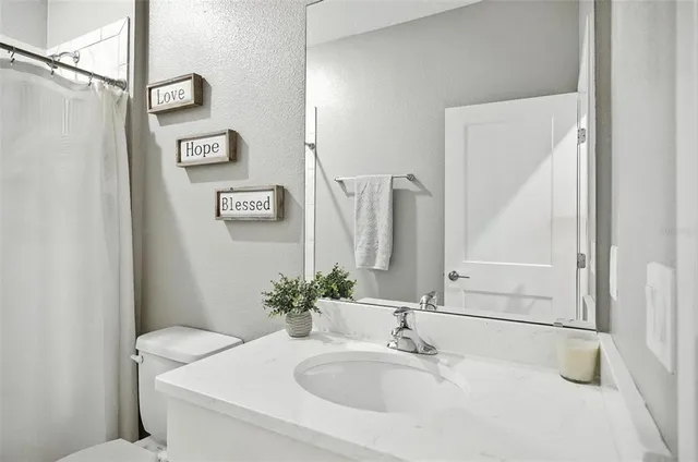 a kitchen that has a sink and a window