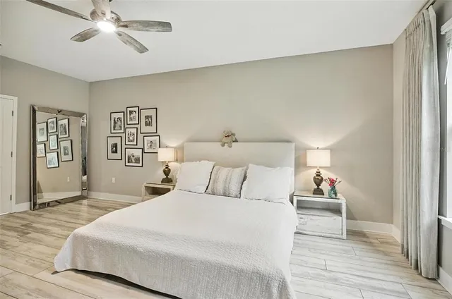 a bathroom with double sink and a mirror