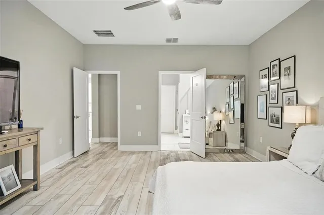 a bathroom with a shower and a sink