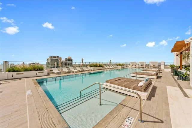 a view of a house with a ocean view