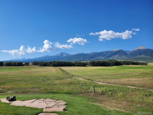 a view of a lake and mountain in the back