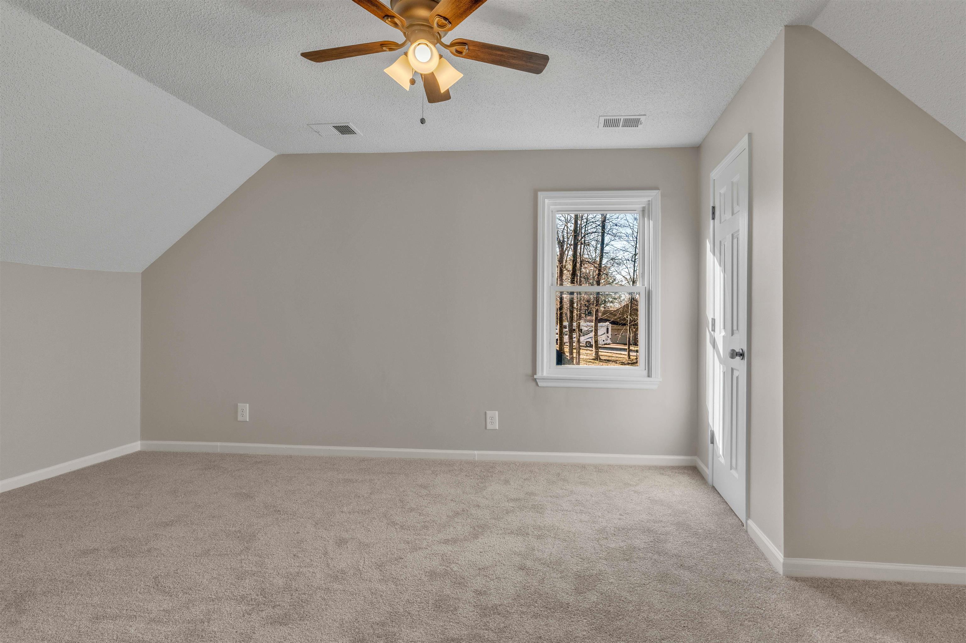 310 Walnut Bend Road Arlington, TN 38002 - Photo 27 of 40 a view of an empty room with a window