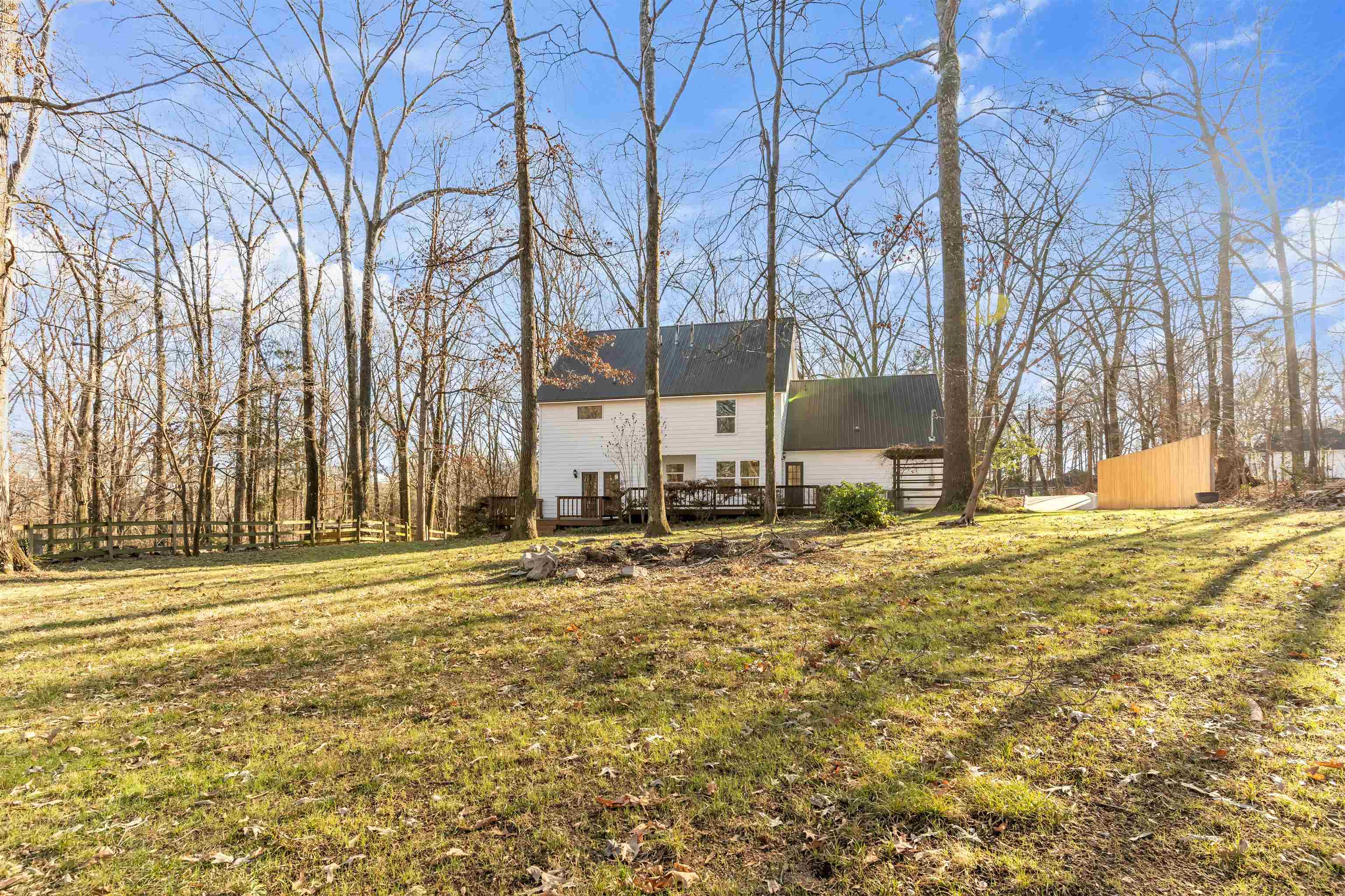 310 Walnut Bend Road Arlington, TN 38002 - Photo 33 of 40 a backyard of apartments with large trees