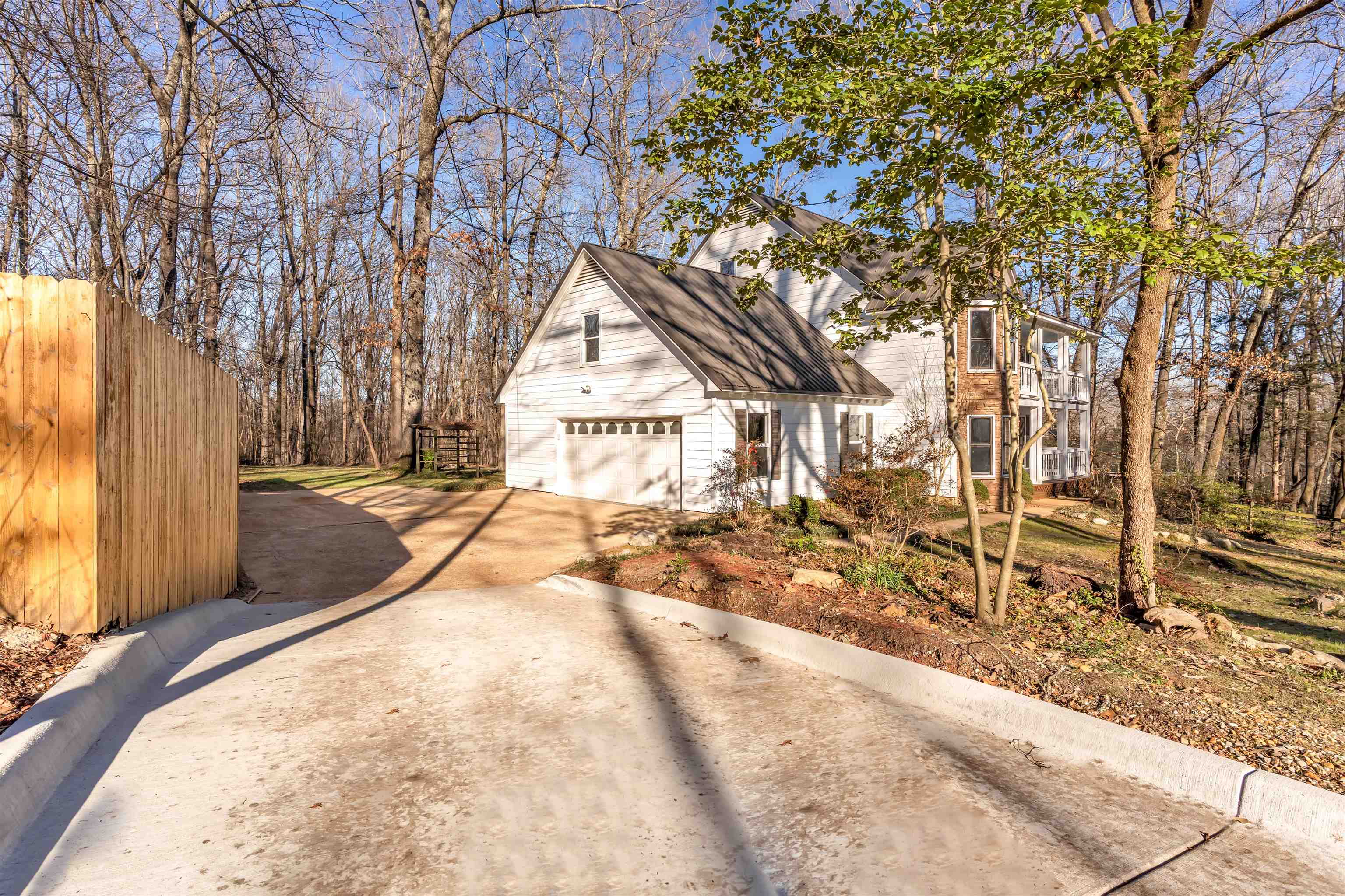 310 Walnut Bend Road Arlington, TN 38002 - Photo 36 of 40 a view of a backyard with a trees