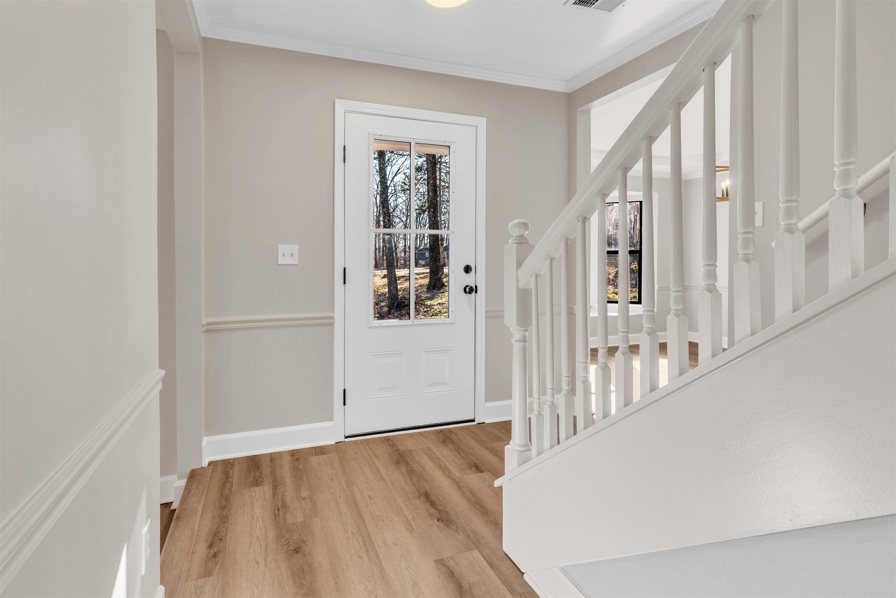 310 Walnut Bend Road Arlington, TN 38002 - Photo 9 of 40 a view of an entryway with wooden floor