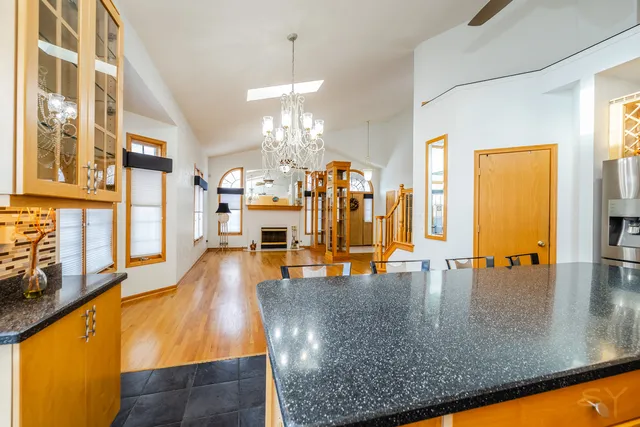 a view of a living room and dining room