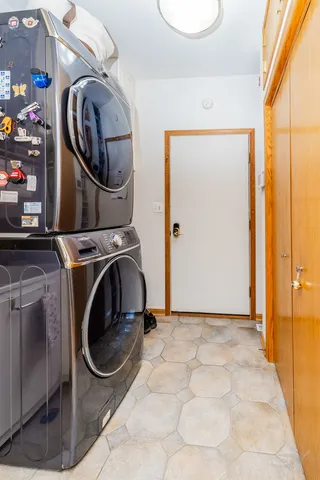 a view of bathroom with washer and dryer
