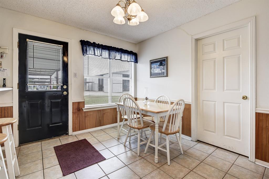 365 Country Lane Haslet, TX 76052 - Photo 13 of 34 a dining room with furniture and window