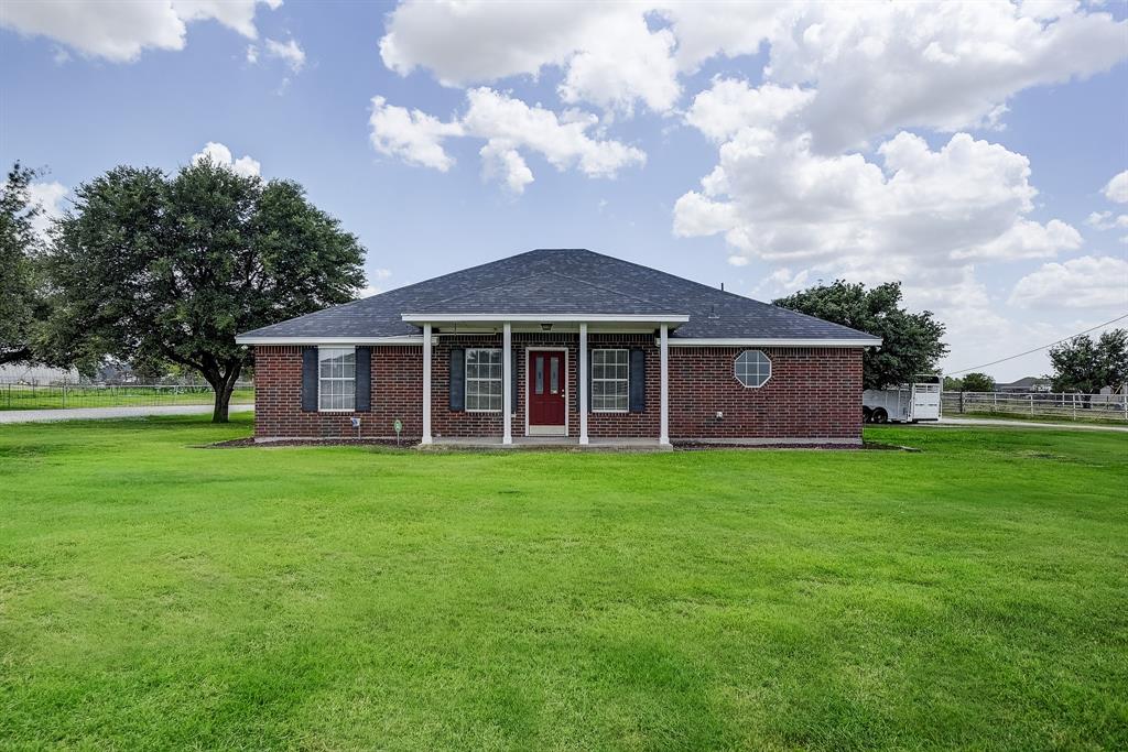365 Country Lane Haslet, TX 76052 - Photo 2 of 34 a front view of a house with garden