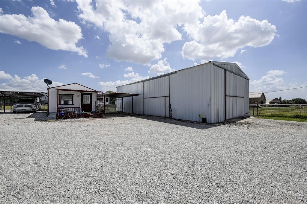 365 Country Lane Haslet, TX 76052 - Photo 25 of 34 a view of a house with a backyard