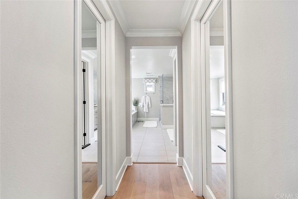 65 Rockinghorse Irvine, CA 92602 - Photo 23 of 43 a view of a bathroom from a hallway with toilet
