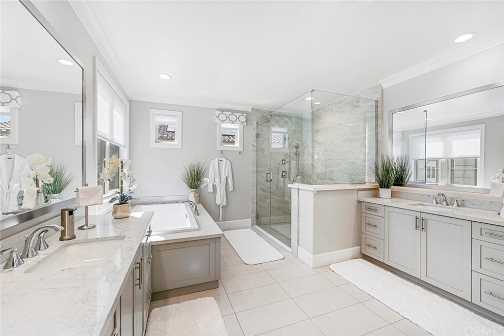 65 Rockinghorse Irvine, CA 92602 - Photo 24 of 43 a large white kitchen with a large window